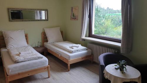 Postel nebo postele na pokoji v ubytování Hotel PB