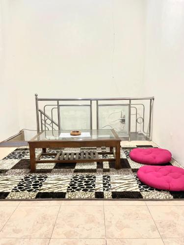 Гостиная зона в HARMONI GUEST HOUSE tumpak sewu