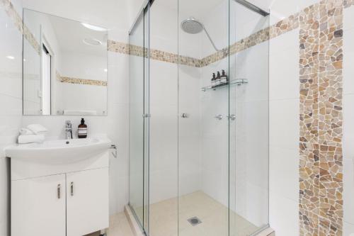 a bathroom with a shower and a sink at 'Avondale' Luxe Country Retreat in Pitt Town