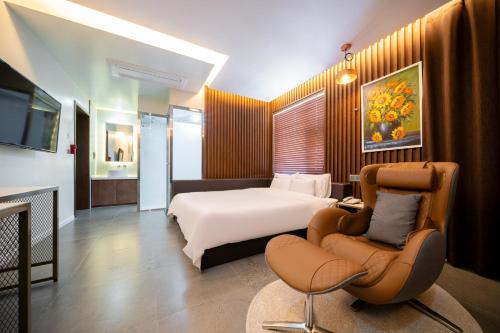 Postel nebo postele na pokoji v ubytování Suncheon Hound Hotel Suncheon Station Branch