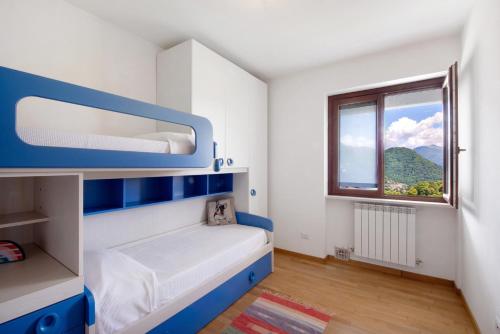 Ένα ή περισσότερα κρεβάτια σε δωμάτιο στο Loft bellavista