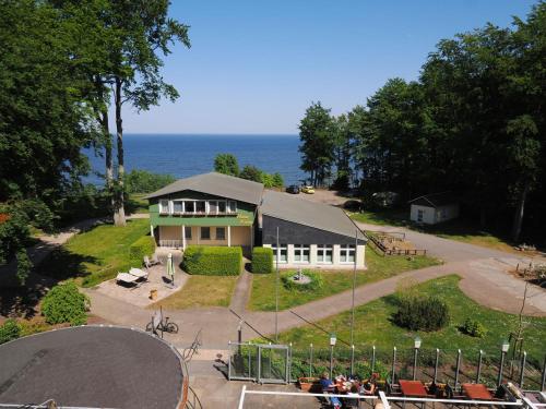 a house with a skate ramp in front of it at Forsthaus Langenberg in Bansin