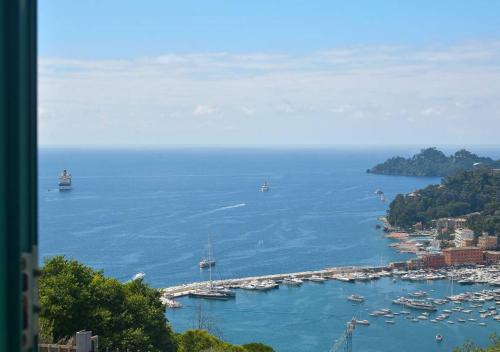 a view of a harbor with boats in the water at Andromeda Flexyrent in Rapallo