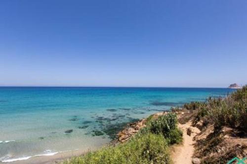 a view of the ocean from a beach at Dar Barsha: Beach front white sand and happiness in Rafrāf