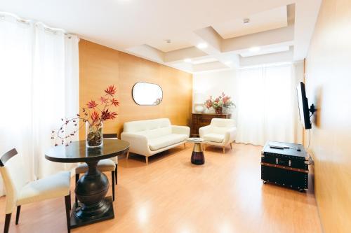 Χώρος καθιστικού στο Hotel Excelsior Bari
