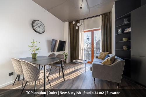 Foto Cosy studio apartment in Ridzenes residence 1