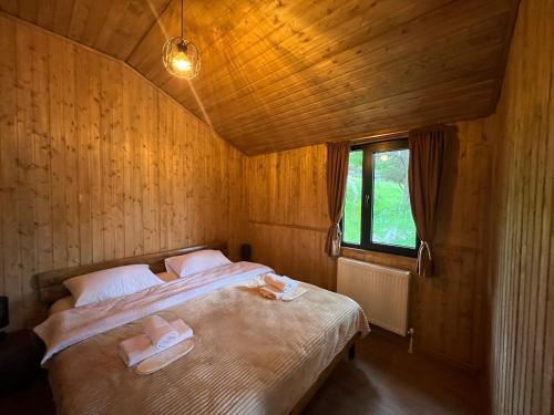 Postel nebo postele na pokoji v ubytování Elia Hut Kazbegi