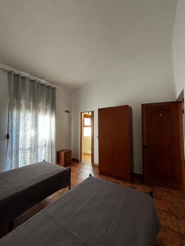 Postel nebo postele na pokoji v ubytování BedGodini