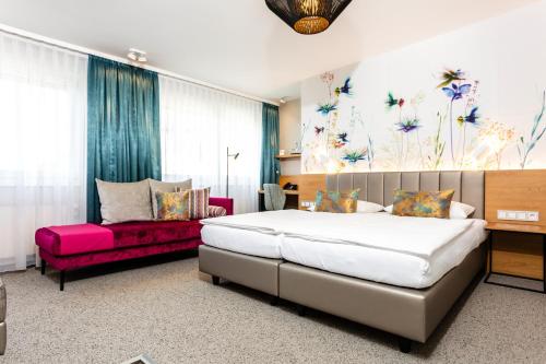 Postel nebo postele na pokoji v ubytování Hotel Boehler
