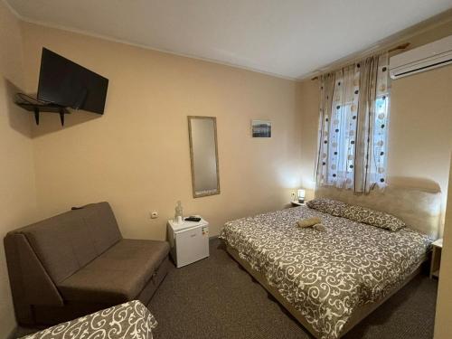 Postel nebo postele na pokoji v ubytování Vila Razic