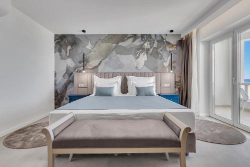 Postel nebo postele na pokoji v ubytování Hotel Laurentum