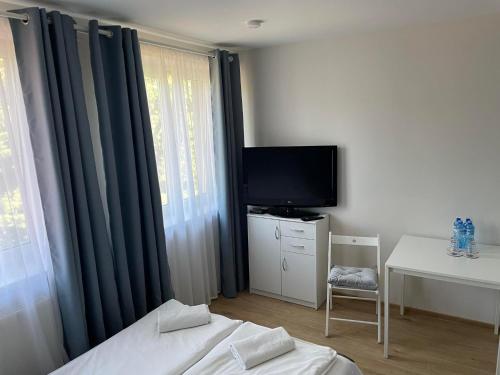 Telewizja i/lub zestaw kina domowego w obiekcie Mozaikowy Piec