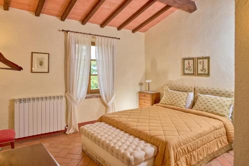 Un pat sau paturi într-o cameră la Agriturismo Le Case