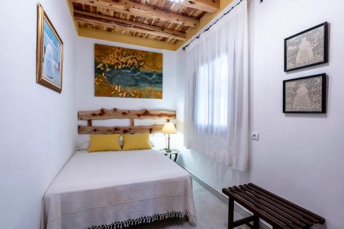 Postel nebo postele na pokoji v ubytování Villa Can Cardona