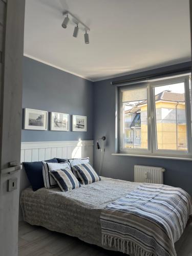 Posteľ alebo postele v izbe v ubytovaní Apartament Ustecka Ostoja Na Wydmie