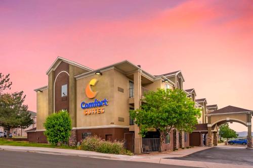 a building with a c participant fitness sign on it at Comfort Suites in Castle Rock