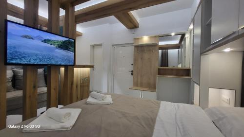Llit o llits en una habitació de Global Apartments