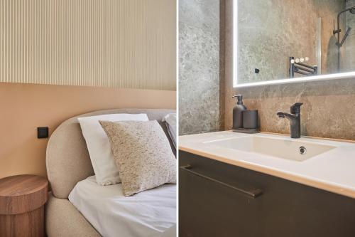 une salle de bain avec un lavabo et un miroir dans l'établissement Amazing Apartment Le Marais Center of Paris by Studio Prestige, à Paris