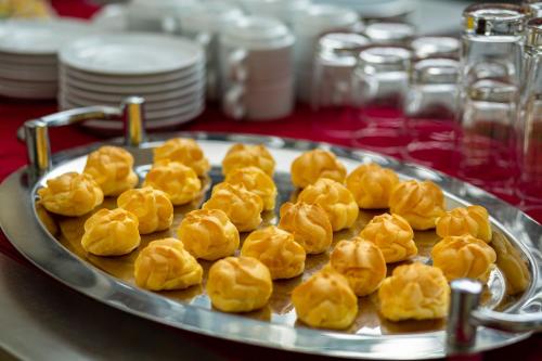 a plate of dumplings on top of a table at Sapa Praha Hotel in Sa Pa