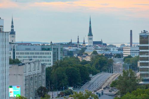 a view of a city with many tall buildings at Revalia Vektor Fantastic View Apartment in Tallinn