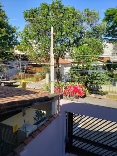 a view of a yard from a balcony of a house at Pousada Monte Gerizim in Sao Paulo