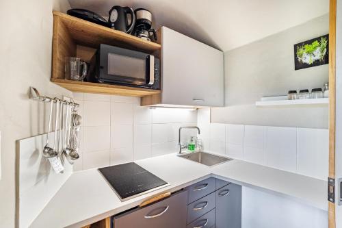 Una cocina o zona de cocina en Residence Grünbacher