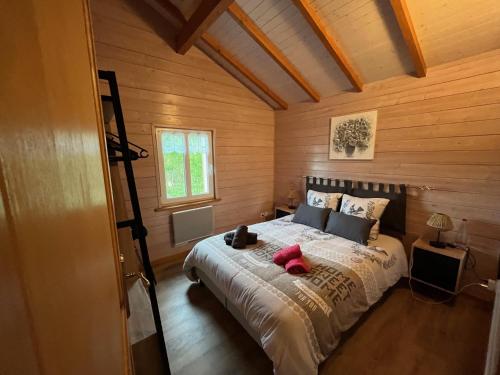 Ένα ή περισσότερα κρεβάτια σε δωμάτιο στο Fermette Valolive