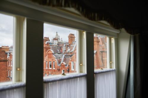 a view of a city from a window at Egerton House in London