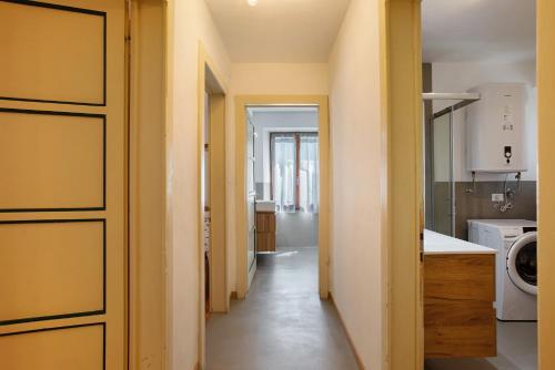 En eller flere senge i et værelse på Spazioso Appartamento a Courmayeur