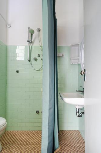 a bathroom with a shower and a sink at Hotel Sayonara in Bellaria-Igea Marina