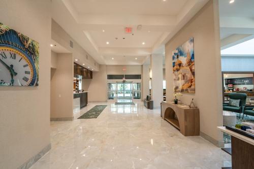 a lobby with a large clock on the wall at Hampton Inn St Augustine Downtown Historic Distric in St. Augustine