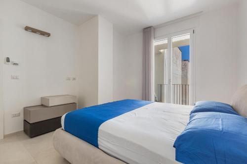 En eller flere senge i et værelse på Attico Smeraldo by Perle di Puglia