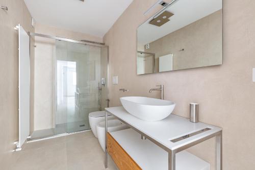 Et badeværelse på Attico Smeraldo by Perle di Puglia