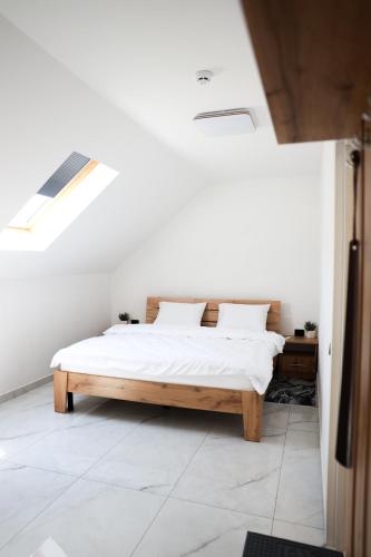 Postel nebo postele na pokoji v ubytování M-23 Hotel