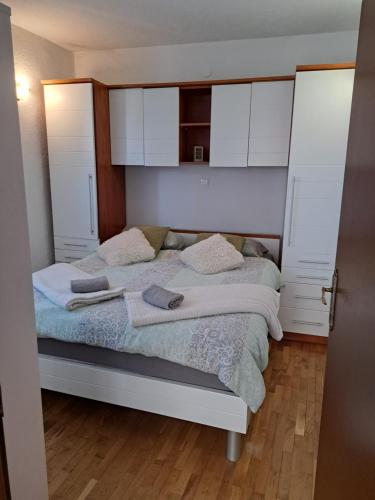Posteľ alebo postele v izbe v ubytovaní Apartment M&M