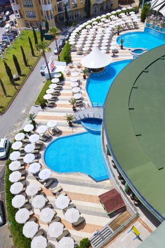 an overhead view of a resort with umbrellas and swimming pools at Hotel Marvel All Inclusive - FULLY RENOVATED FREE Beach Access in Sunny Beach