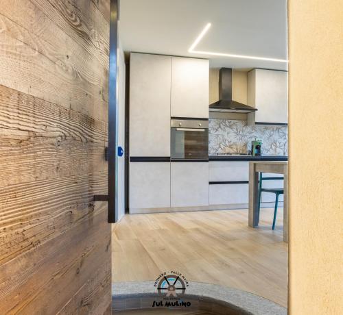 Una cocina o zona de cocina en Residenza SUL MULINO