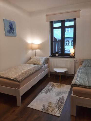 Postel nebo postele na pokoji v ubytování Apartmán Amálie