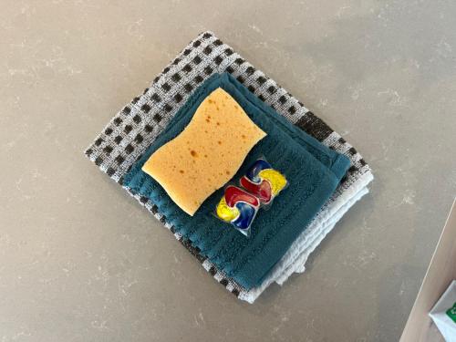 a plate with a piece of cheese on a table at House of Legend in Antwerp