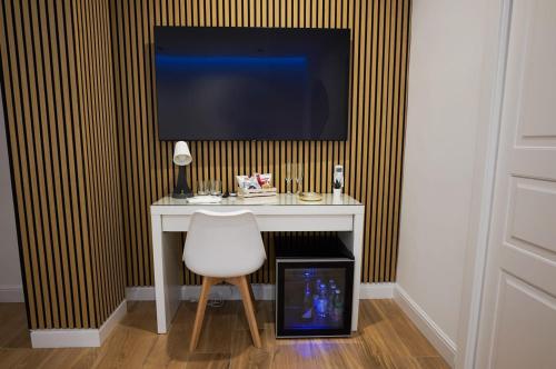Μια τηλεόραση ή/και κέντρο ψυχαγωγίας στο Luxury room