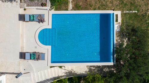 Πισίνα στο ή κοντά στο Villa Favola Omis 360 PHOTOS-VIRTUAL TOUR ON DEMAND
