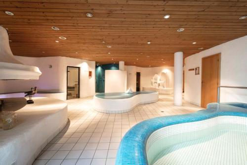 Alpenlodge - Das Dorfhotelにあるベッド