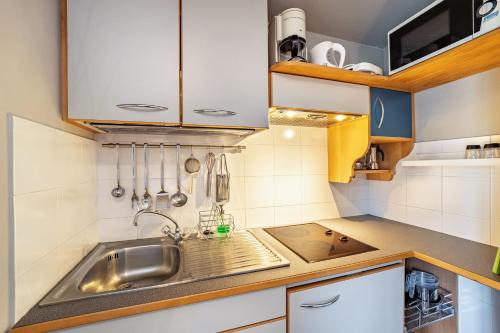 Una cocina o zona de cocina en Residence Grünbacher