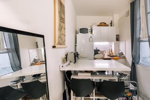 Photo de la galerie de l'établissement GuestReady - Cosy studio mezzanine in Paris, à Paris