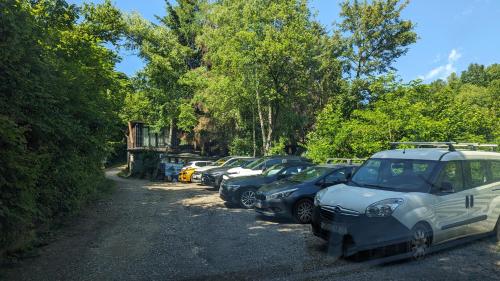 a row of cars parked in a parking lot at Holiday Home Nature Neno in Visoko