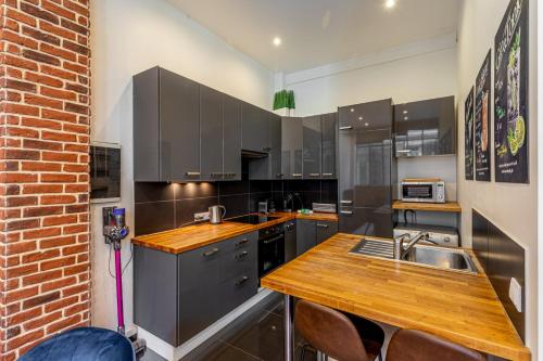 Zdjęcie z galerii obiektu GuestReady - Apto Parisiense da moda no 19º Arr. w Paryżu