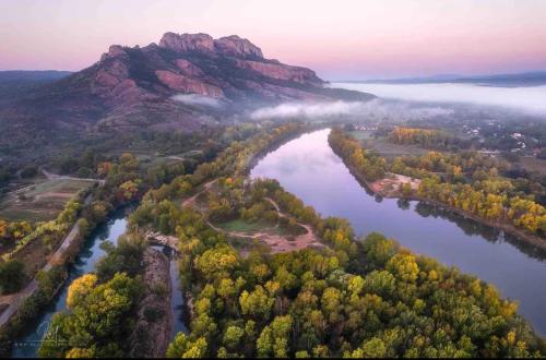 an aerial view of a river with a mountain at Maison Isal in Roquebrune-sur-Argens