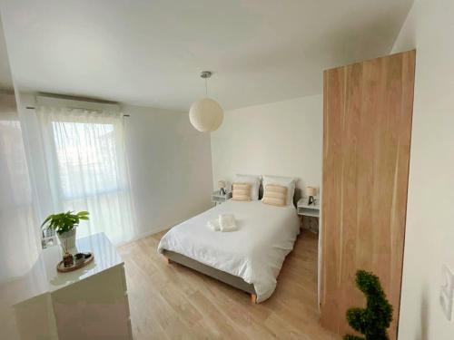 Ένα ή περισσότερα κρεβάτια σε δωμάτιο στο Lovely Flat