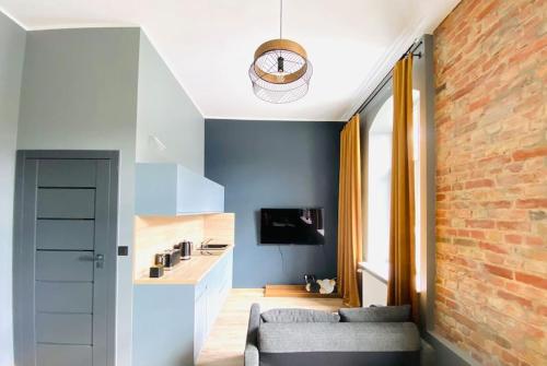 Kuchyňa alebo kuchynka v ubytovaní Nowy apartament studio Długa