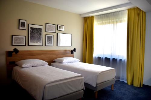 Postel nebo postele na pokoji v ubytování Tulip Hotels - Wroclaw Centre